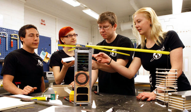 Finnish students working on the Aalto-1 CubeSat
