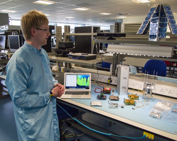 Dr Chris Bridges M6OBC working on STRaND-1 - Image credit Surrey Space Centre