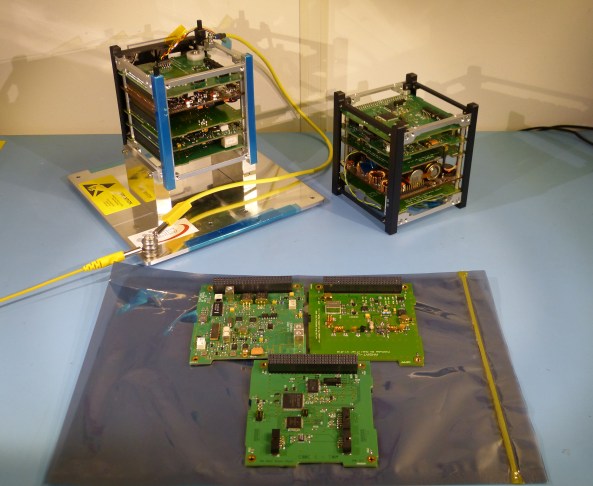 Flight and Engineering Models of FUNcube-1 with FUNcube-2 boards