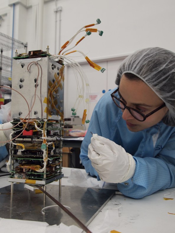 Dr Susan Jason working on STRaND-1 - Image credit Surrey Space Centre