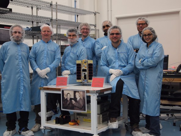 STRaND-1 and the team from left to right Ed Simons, Steve O’Donnell, Shaun Kenyon, Chris Bridges M6OBC / M0GKK, Nimal Navarathinam VE3NML, Pete Shaw, Ed Stevens, Susan Jason - Image credit Surrey Space Centre (SSC)