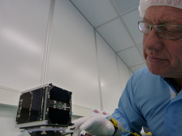 FUNcube-1 spacecraft in the clean room with Graham Shirville G3VZV