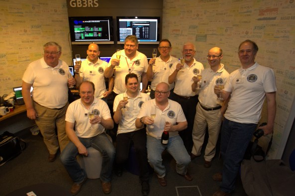 FUNcube team celebrate with champagne