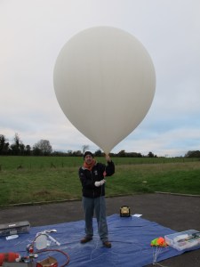 Archive Image - Ali Al-Azzawi M0PSI with a balloon - Credit Dave Akerman M6RPI
