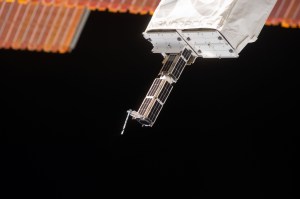Planet Labs Dove CubeSats emerging from NanoRacks deployer February 11, 2014