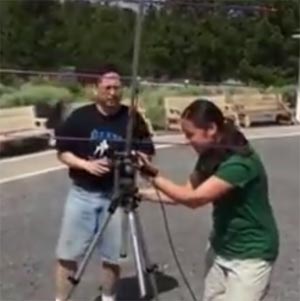 Students adjusting the antenna